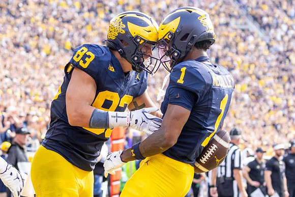 Zack Marshall (83) and Donaven McCulley (1)