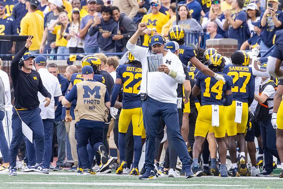 Grant Newsome and Michigan Team