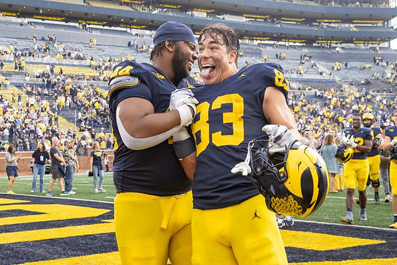 Damon Payne (44) and Zack Marshall (83)