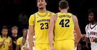 Yaxel Lendeborg (23) and Will Tschetter (42)