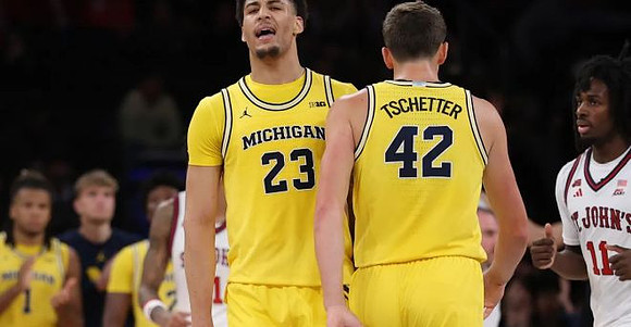 Yaxel Lendeborg (23) and Will Tschetter (42)