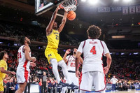 Morez Johnson Jr. (21) and Elliot Cadeau (3)