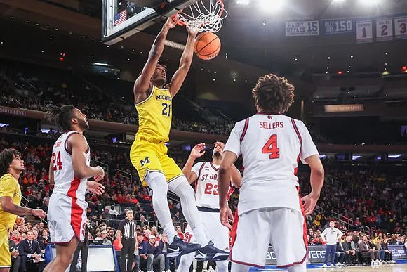 Morez Johnson Jr. (21) and Elliot Cadeau (3)