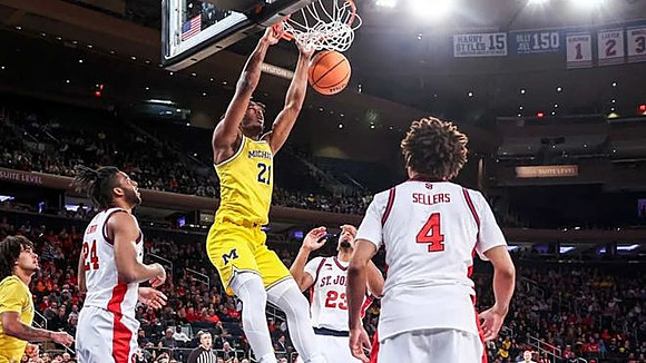 Elliot Cadeau (3) and Morez Johnson Jr. (21)