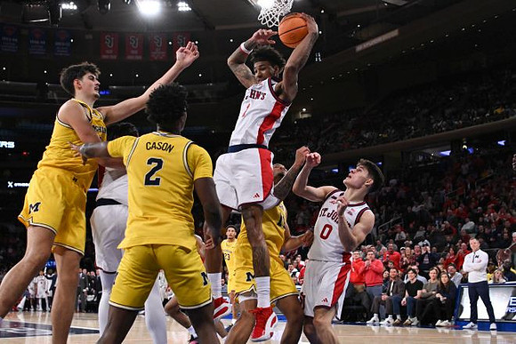 Aday Mara (15), L.J. Cason (2), Yaxel Lendeborg (23), and Roddy Gayle Jr. (11)