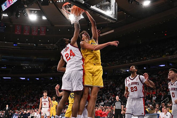 L.J. Cason (2), Will Tschetter (42), and Aday Mara (15)