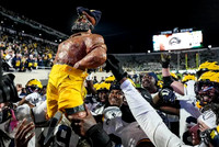 Michigan Team and Paul Bunyan Trophy