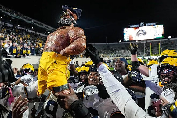 Michigan Team and Paul Bunyan Trophy