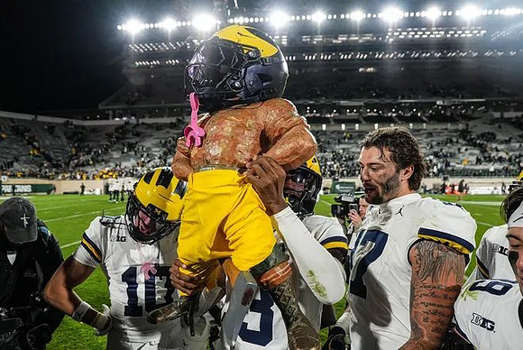 Michigan Team and Paul Bunyan Trophy