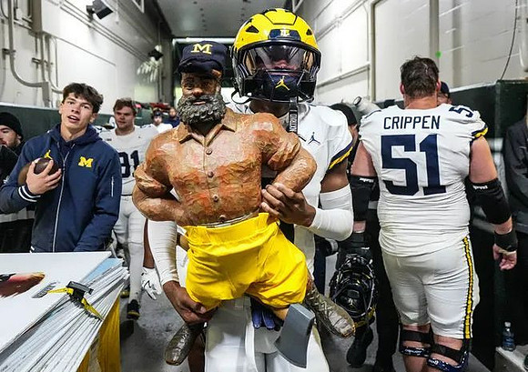 Michigan Team and Paul Bunyan Trophy
