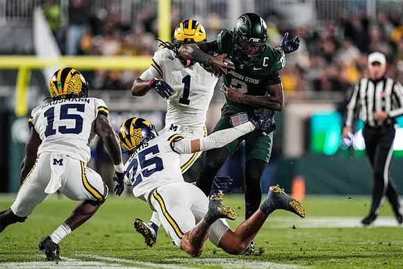 Ernest Hausmann (15), Mason Curtis (25), and Jaishawn Barham (1)
