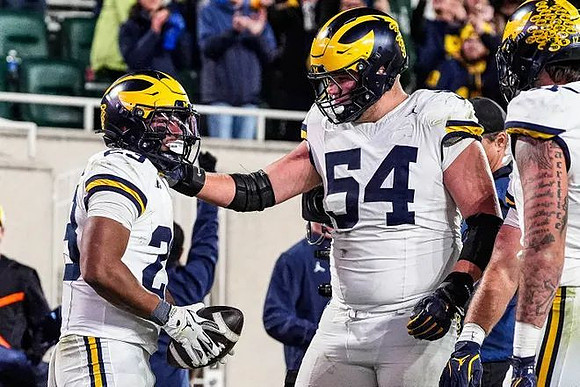 Jordan Marshall (23) and Andrew Sprague (54)