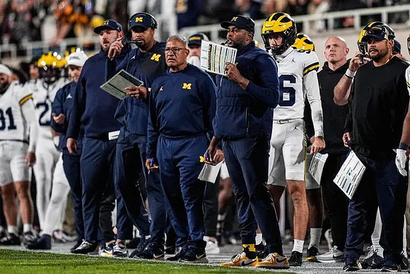 Sherrone Moore and Michigan Team