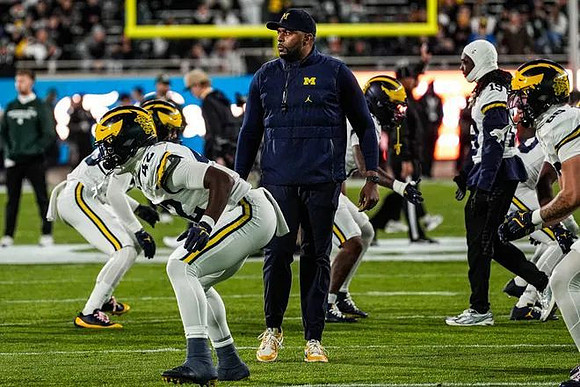 Sherrone Moore and Michigan Team