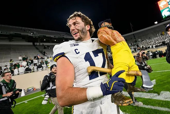 Marlin Klein (17) and Paul Bunyan Trophy