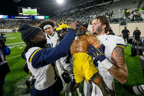 Michigan Team and Paul Bunyan Trophy