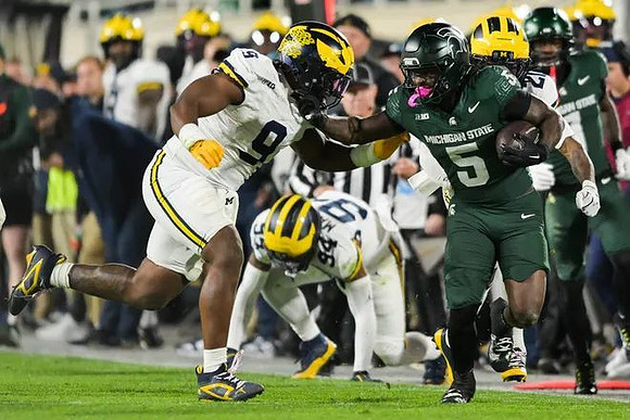 Nate Marshall (94) and Cameron Brandt (9)
