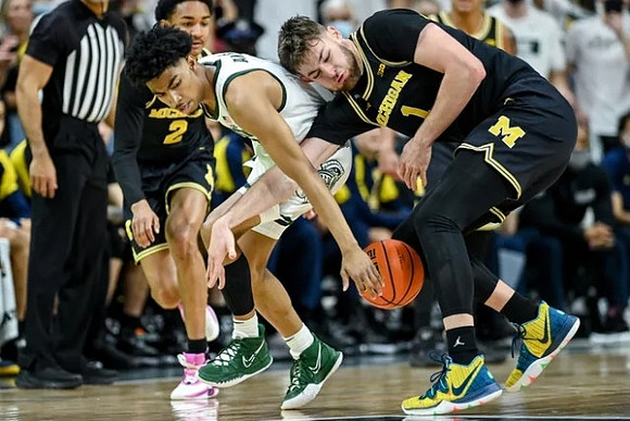 Kobe Bufkin (2) and Hunter Dickinson (1)