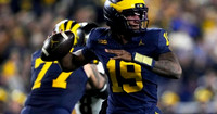 Blake Frazier (77) and Bryce Underwood (19)
