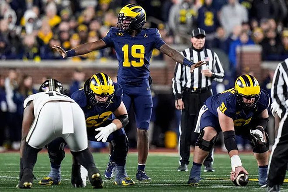 Jake Guarnera (53), Bryce Underwood (19), and Greg Crippen (51)