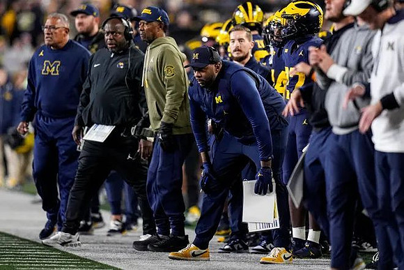 Sherrone Moore and Michigan Team