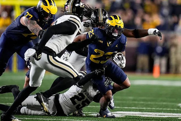 Blake Frazier (77) and Jordan Marshall (23)