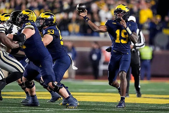 Greg Crippen (51), Jake Guarnera (53), and Bryce Underwood (19)
