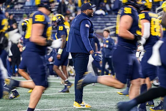 Sherrone Moore and Michigan Team