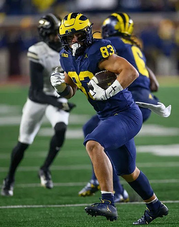 Zack Marshall (83) and Jamar Browder (6)
