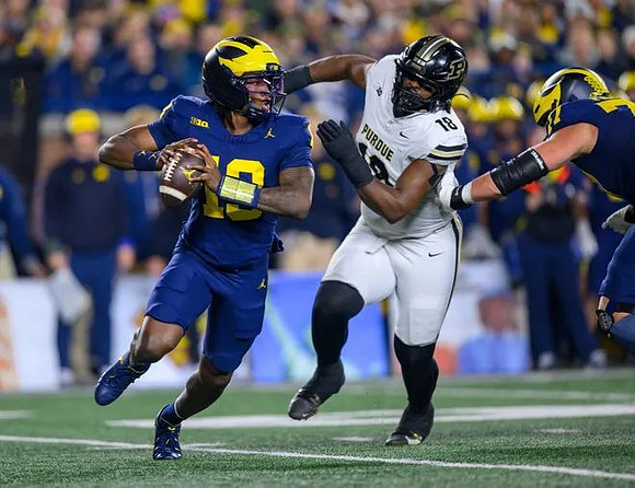 Bryce Underwood (19) and Blake Frazier (77)