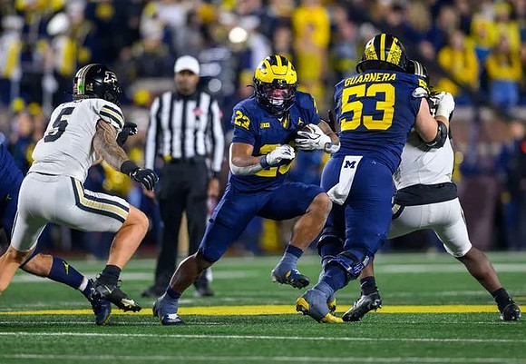 Jordan Marshall (23) and Jake Guarnera (53)