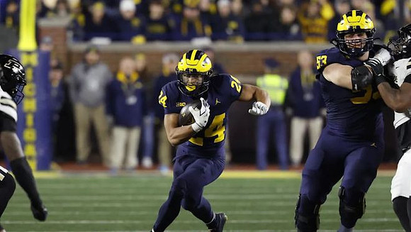 Bryson Kuzdzal (24) and Jake Guarnera (53)