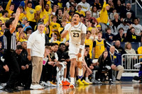 Oakland Head Coach Greg Kampe and Yaxel Lendeborg (23)