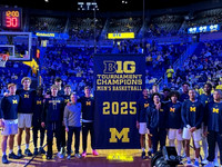 Dusty May, Michigan Team, and 2025 Big Ten Tournament Championship Banner