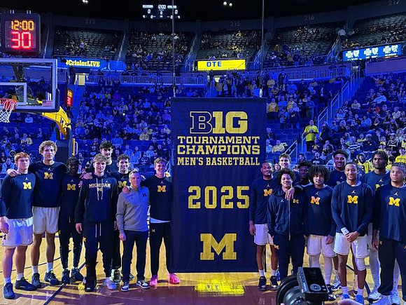 Dusty May, Michigan Team, and 2025 Big Ten Tournament Championship Banner