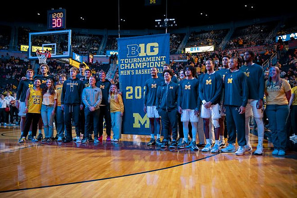 Michigan Team and 2025 Big Ten Tournament Championship Banner