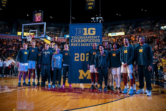 Michigan Team and 2025 Big Ten Tournament Championship Banner