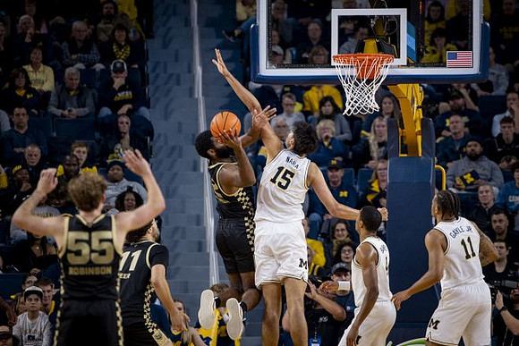 Aday Mara (15), Nimari Burnett (4), and Roddy Gayle Jr. (11)