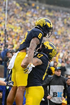 Tyler Morris (8) and Marlin Klein (17)
