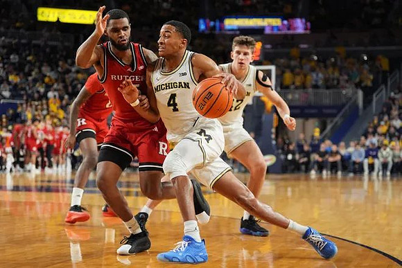 Nimari Burnett (4) and Will Tschetter (42)