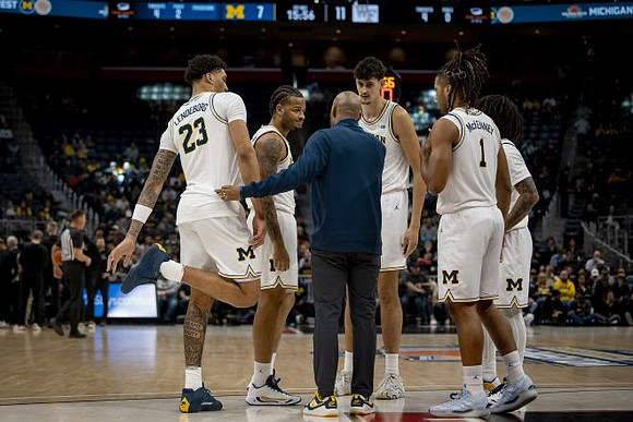 Yaxel Lendeborg (23), Roddy Gayle Jr. (11), Aday Mara (15), Trey McKenney (1), and Elliot Cadeau (3)