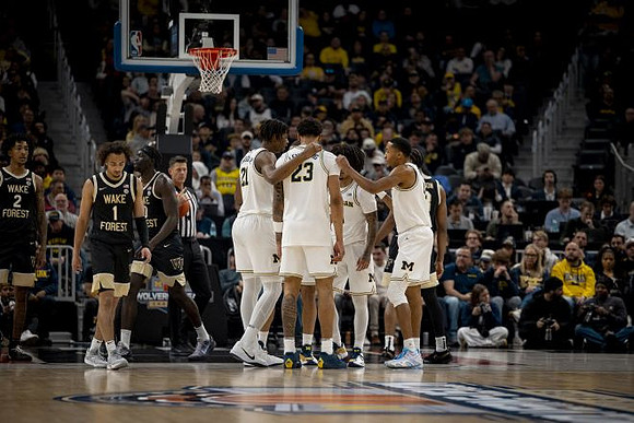 Morez Johnson Jr. (21), Yaxel Lendeborg (23), Elliot Cadeau (3), and Nimari Burnett (4)