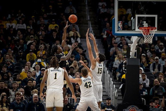 Trey McKenney (1), Will Tschetter (42), and Aday Mara (15)