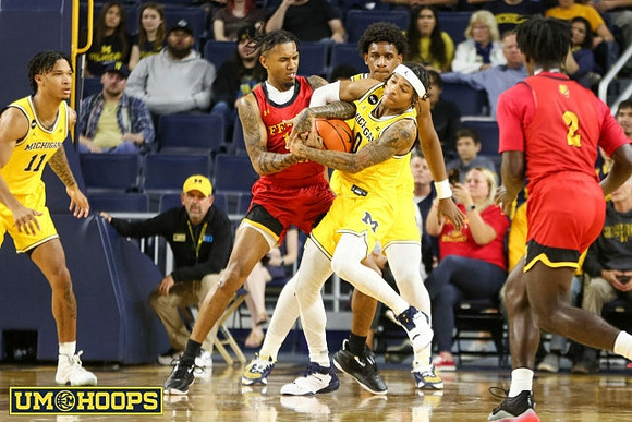 Isaiah Barnes (11) and Dug McDaniel (0)