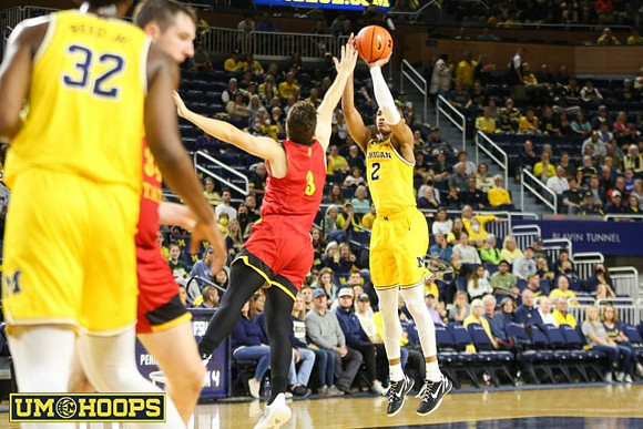 Tarris Reed Jr. (32) and Kobe Bufkin (2)