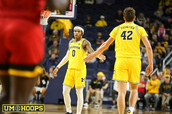 Dug McDaniel (0) and Will Tschetter (42)
