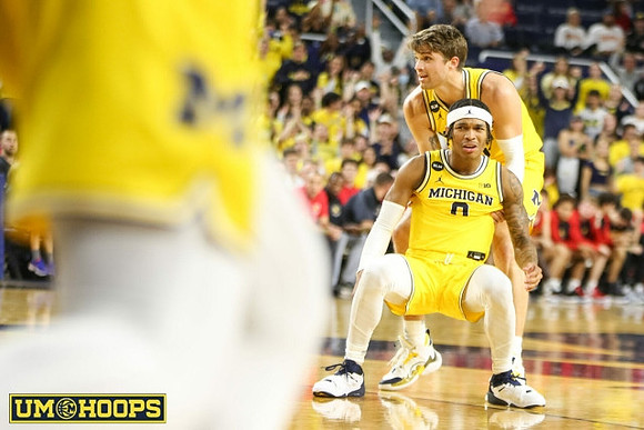 Dug McDaniel (0) and Will Tschetter (42)