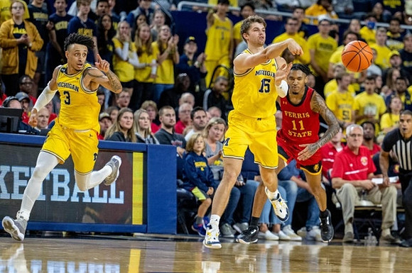 Jaelin Llewellyn (3) and Joey Baker (15)