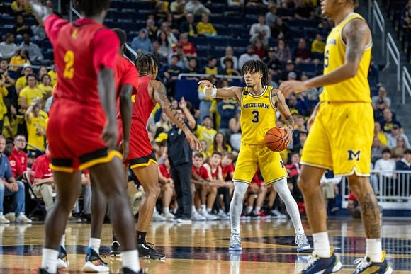 Jaelin Llewellyn (3) and Joey Baker (15)