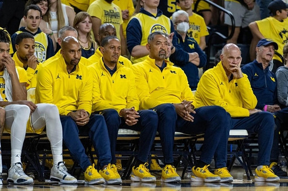 Saddi Washington, Howard Eisley, Juwan Howard, and Phil Martelli